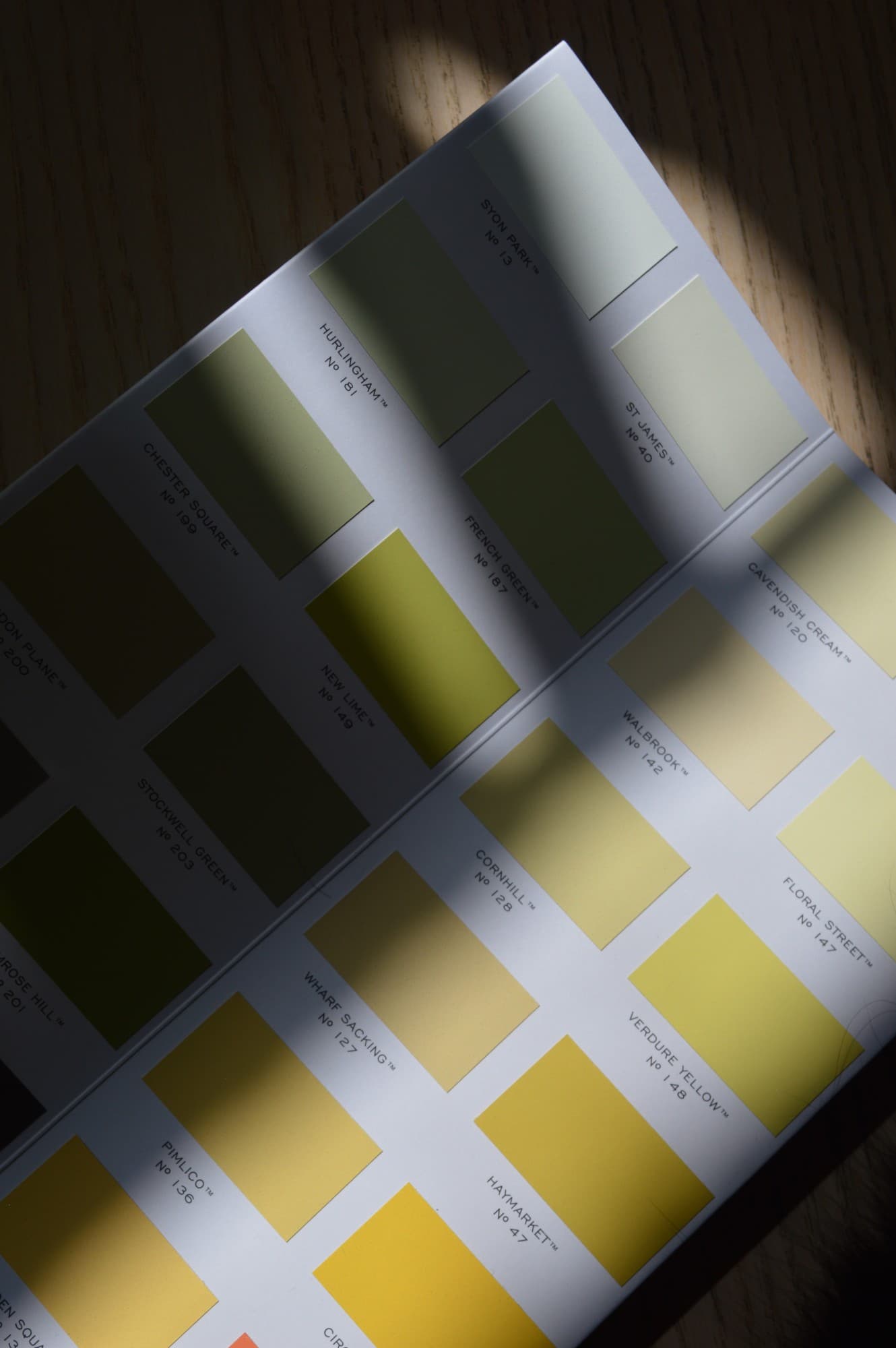 Paint colour swatches fanned out for a colour consultancy